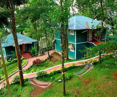 https://imgcld.yatra.com/ytimages/image/upload/t_hotel_yatra_city_desktop/v1479996106/Domestic Hotels/Hotels_Munnar/Blue Bells Valley Resort/Blue_Bells_Valley_Resort.jpg